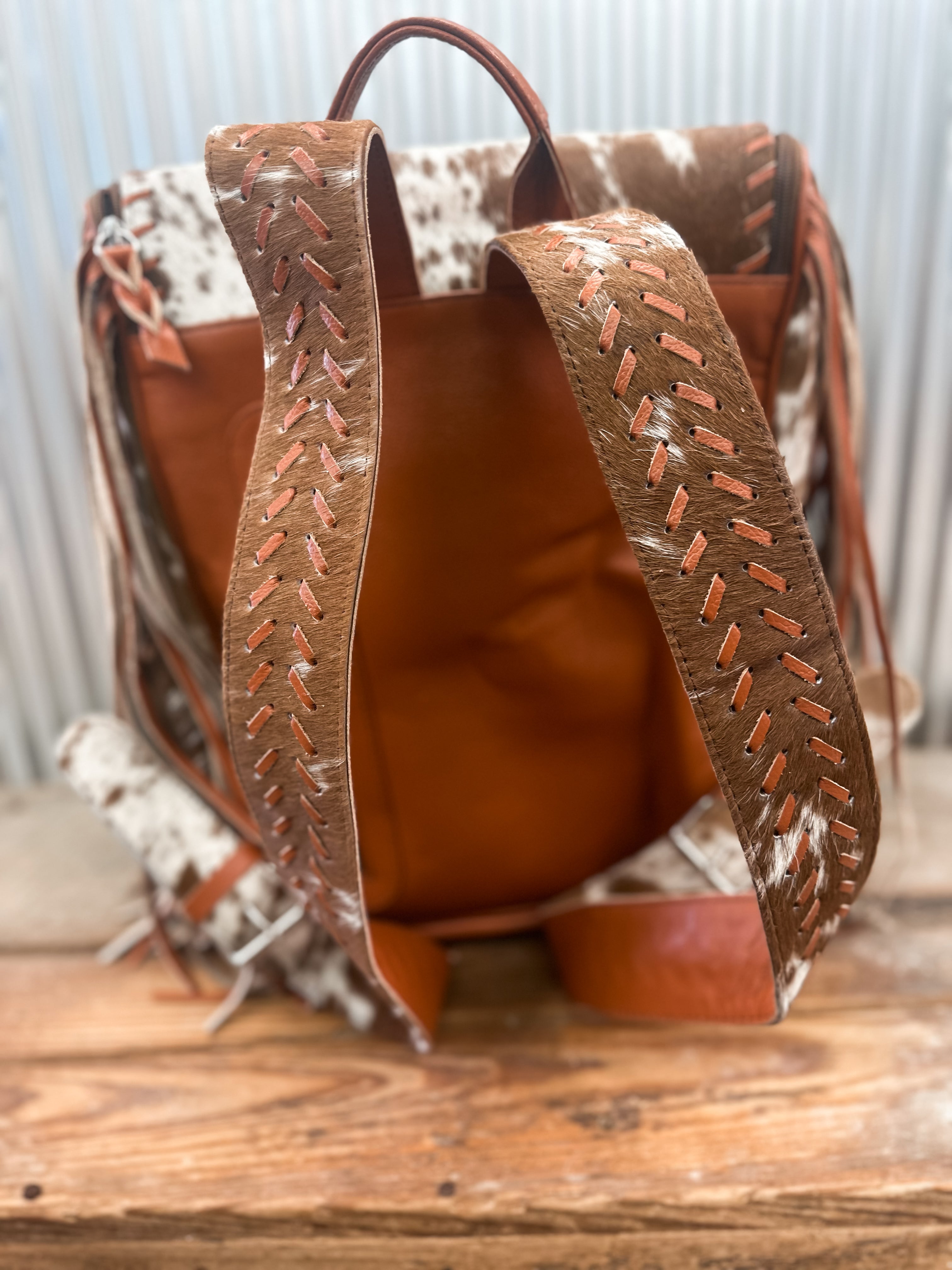 COWHIDE FRINGE BACKPACK - BROWN