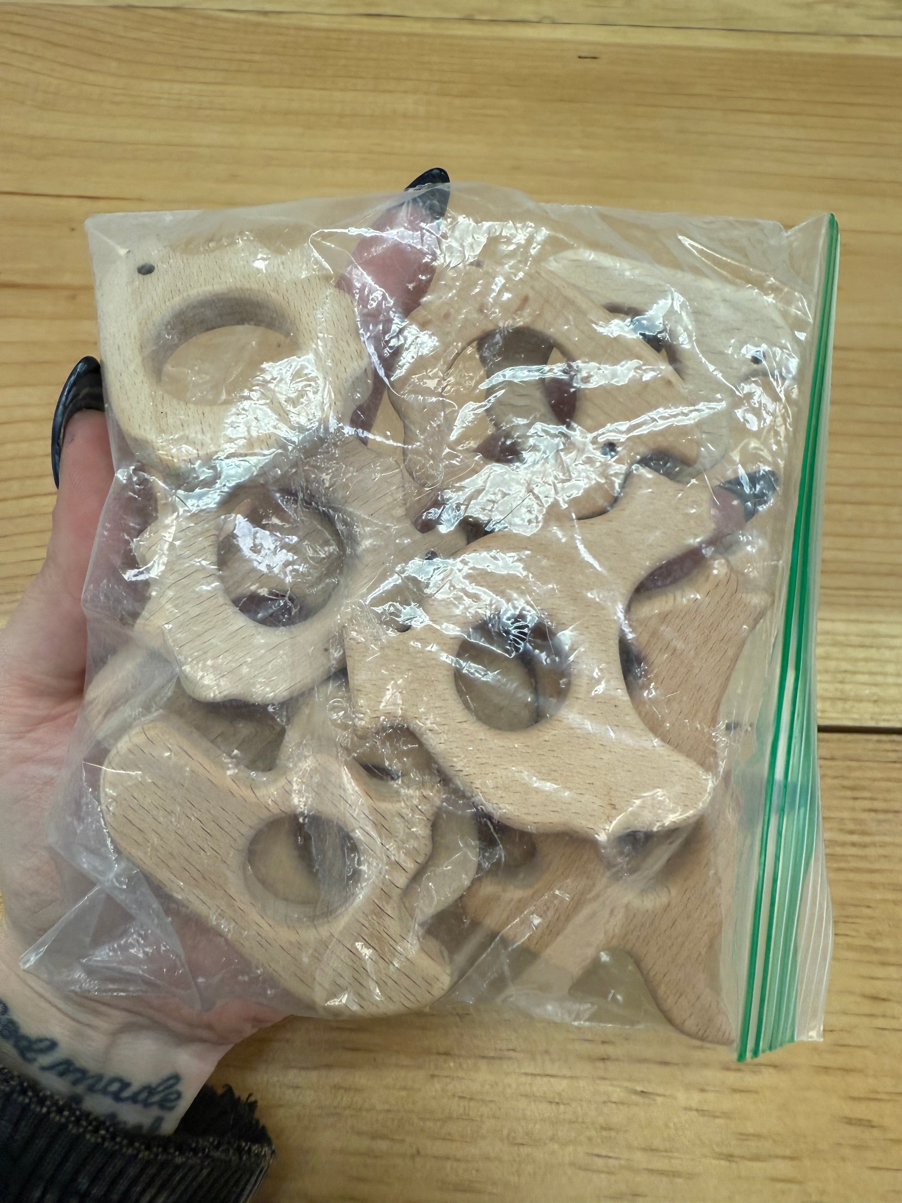 BAG OF WOODEN TEETHERS