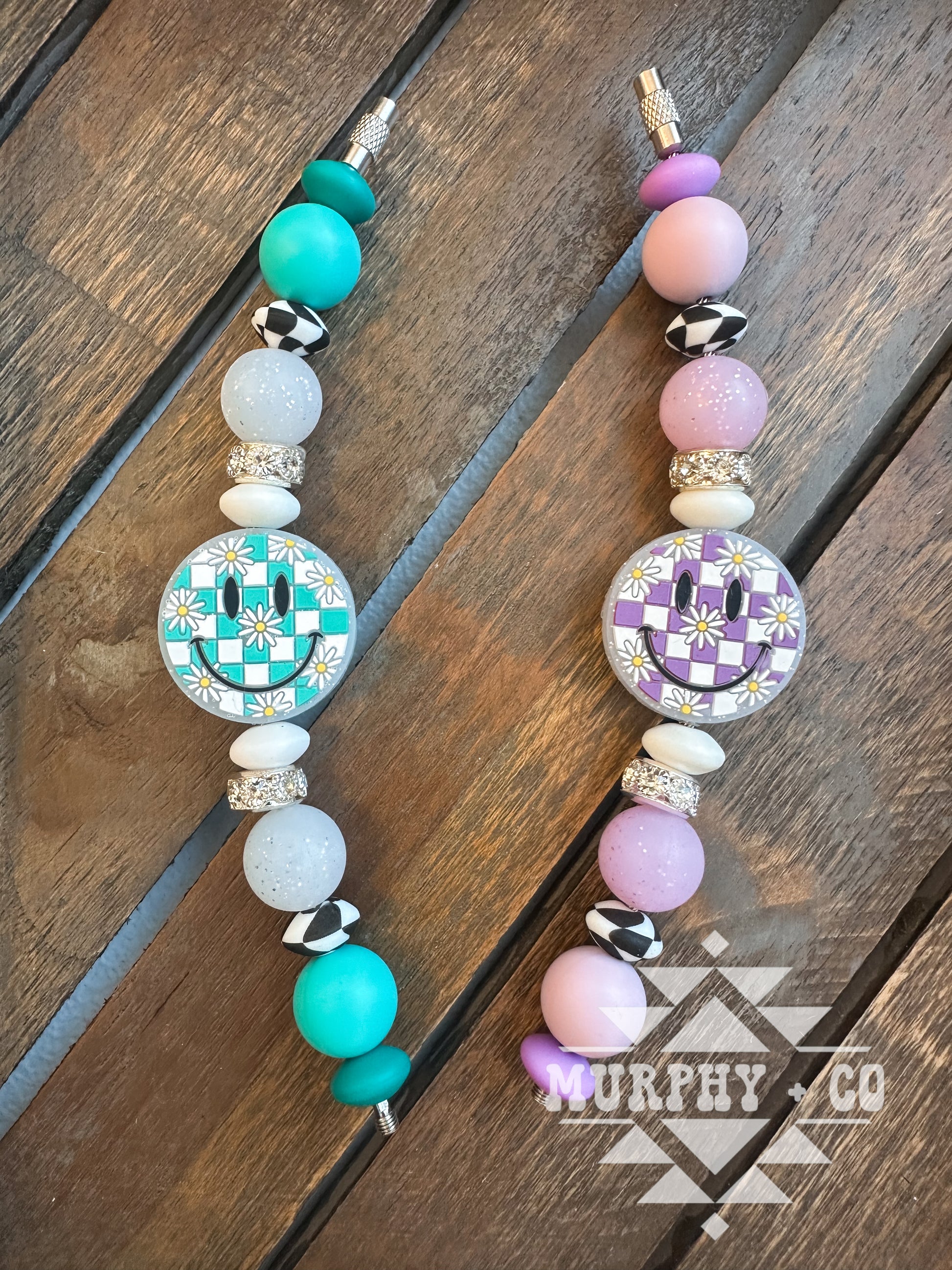 FLOWER CHECKER SMILEY CUP CHARM
