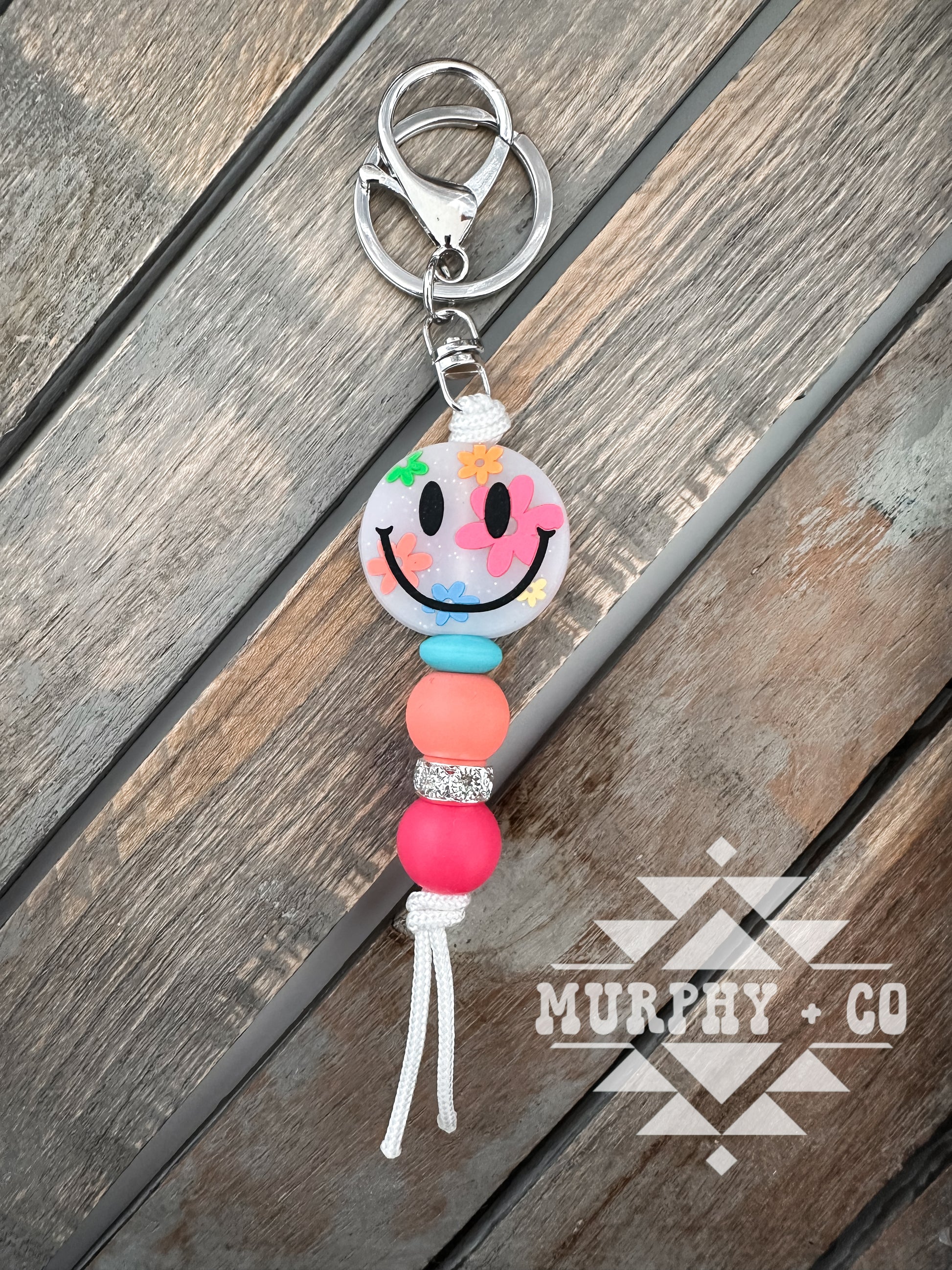 FLORAL SMILEY MINI KEYCHAIN