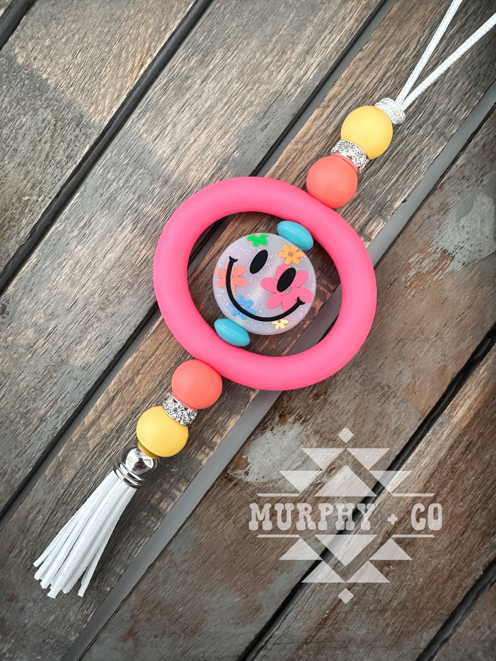 NEON FLORAL SMILEY CAR CHARM