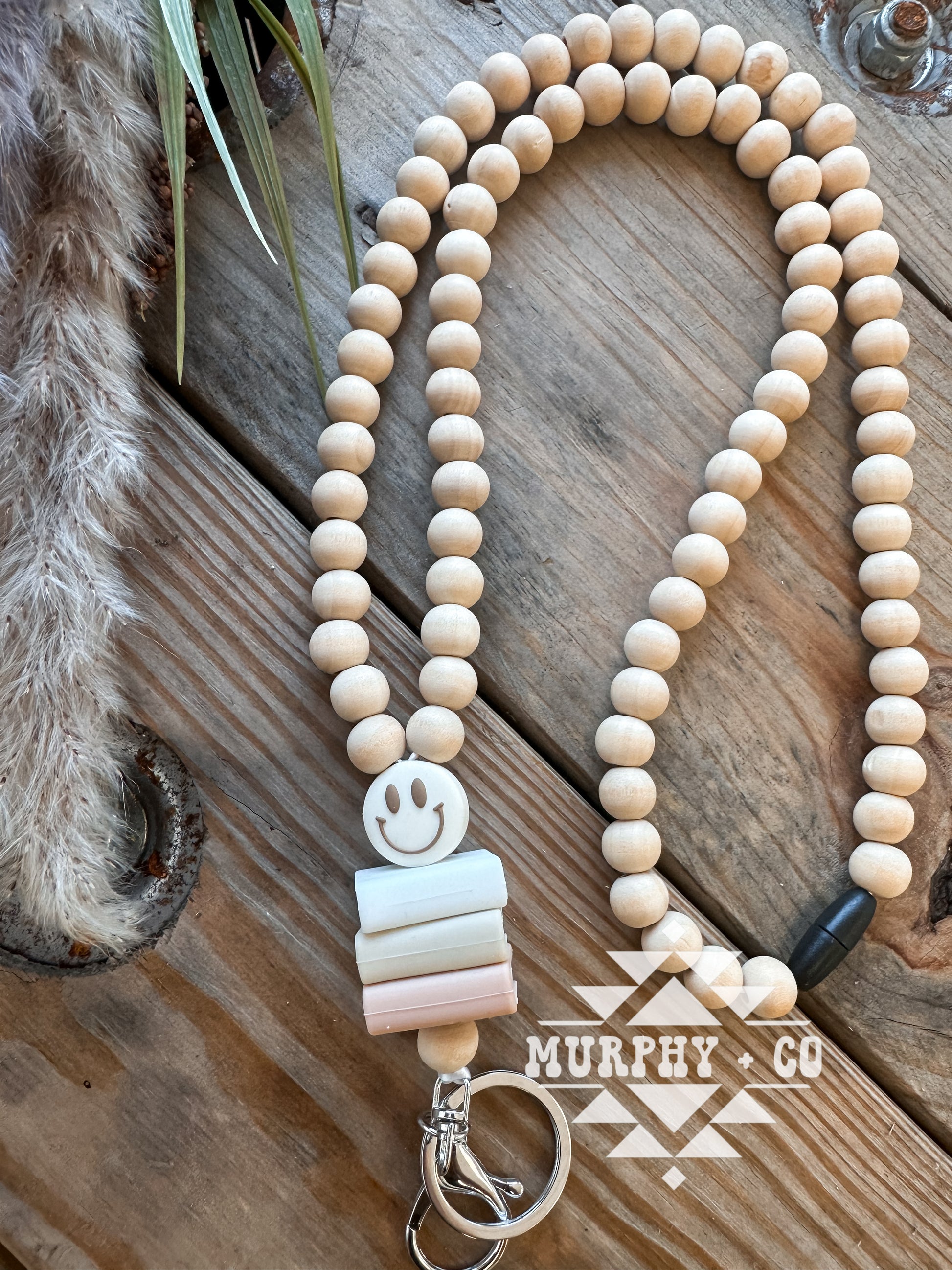 WOODEN BEADED SMILEY BOOKSTACK LANYARD