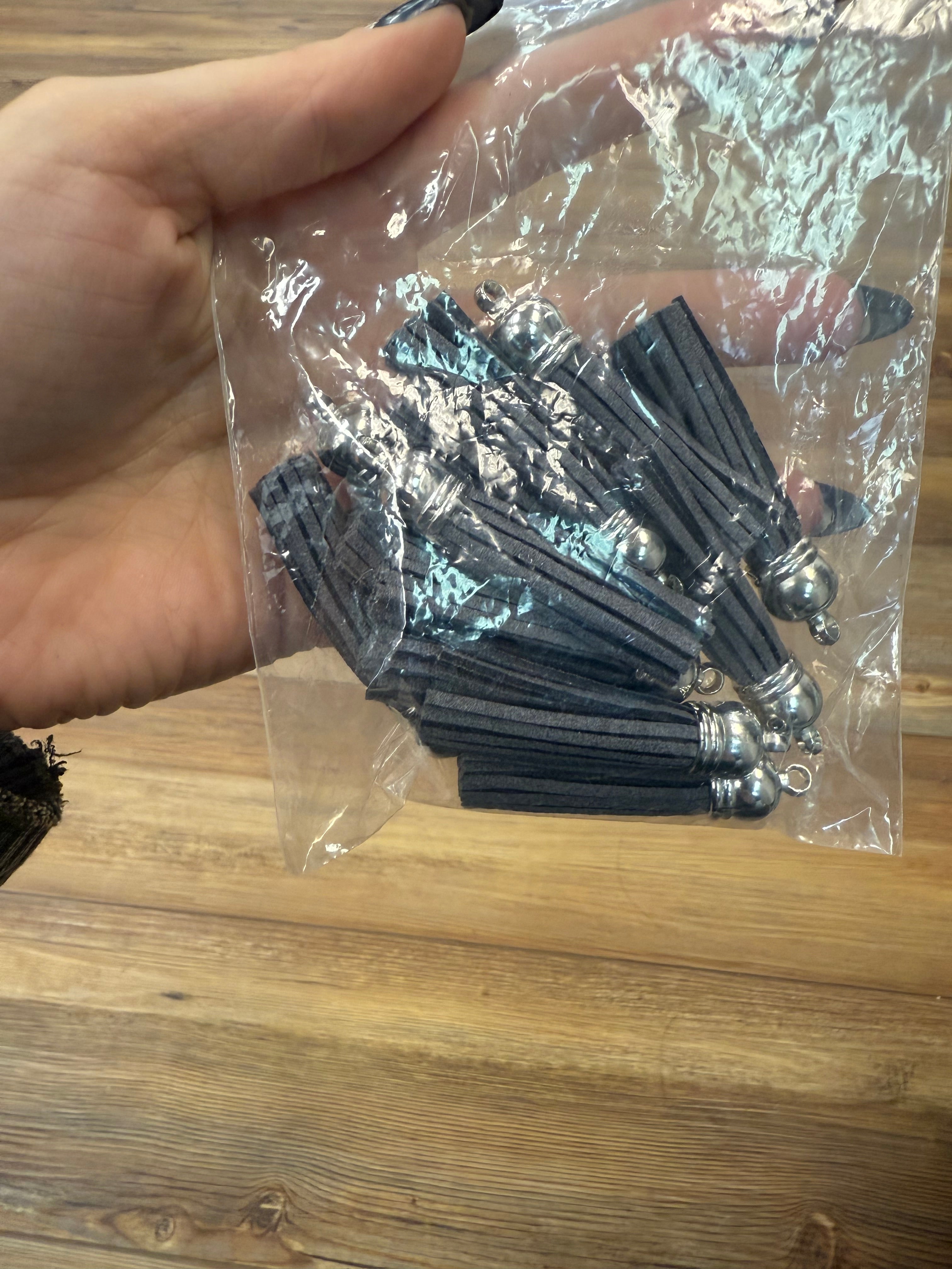 PACKS OF GRAY TASSELS