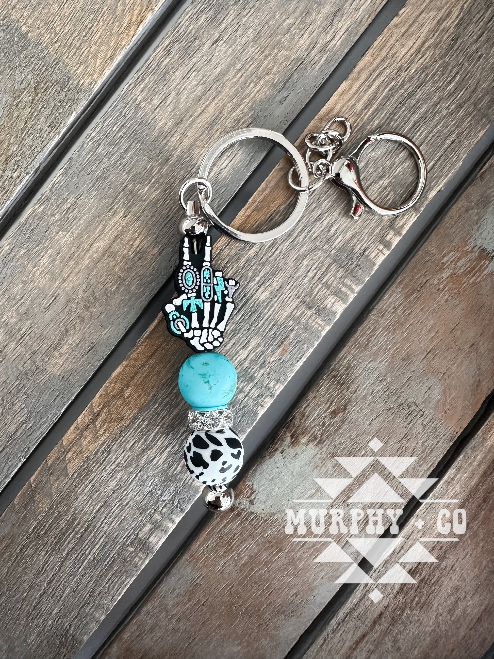 TURQUOISE SKELLIE HAND MINI KEYCHAIN