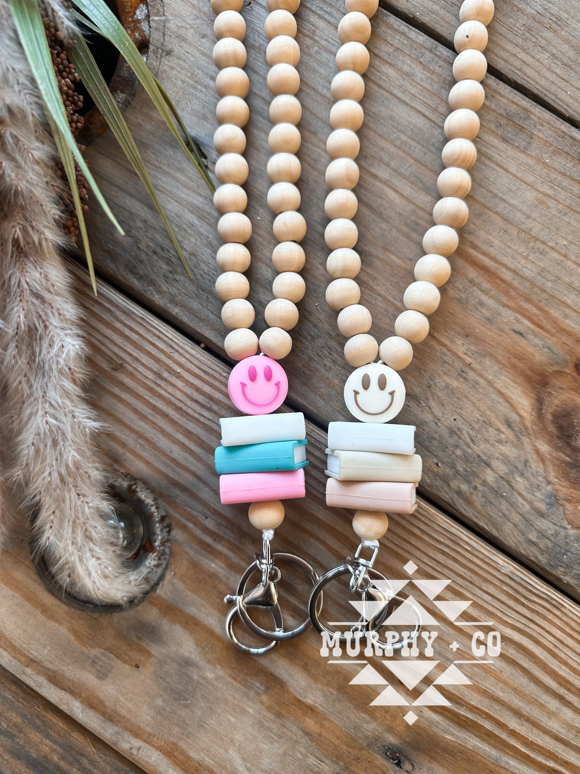 WOODEN BEADED SMILEY BOOKSTACK LANYARD