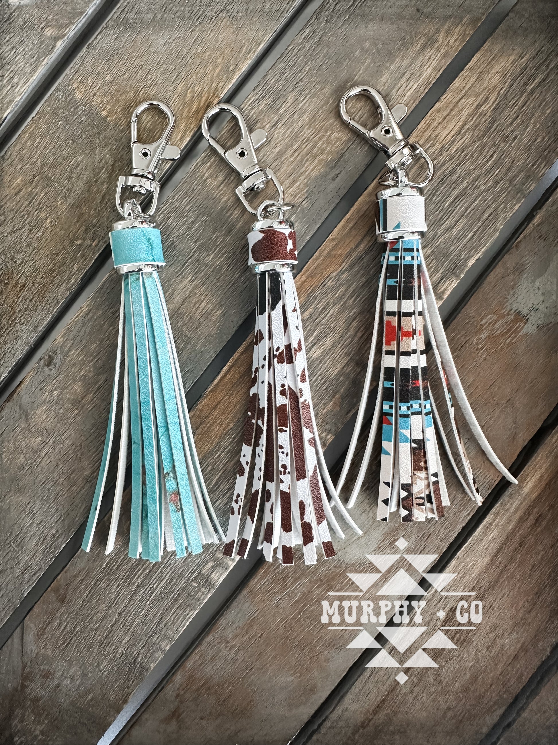 PRINTED FAUX LEATHER TASSEL