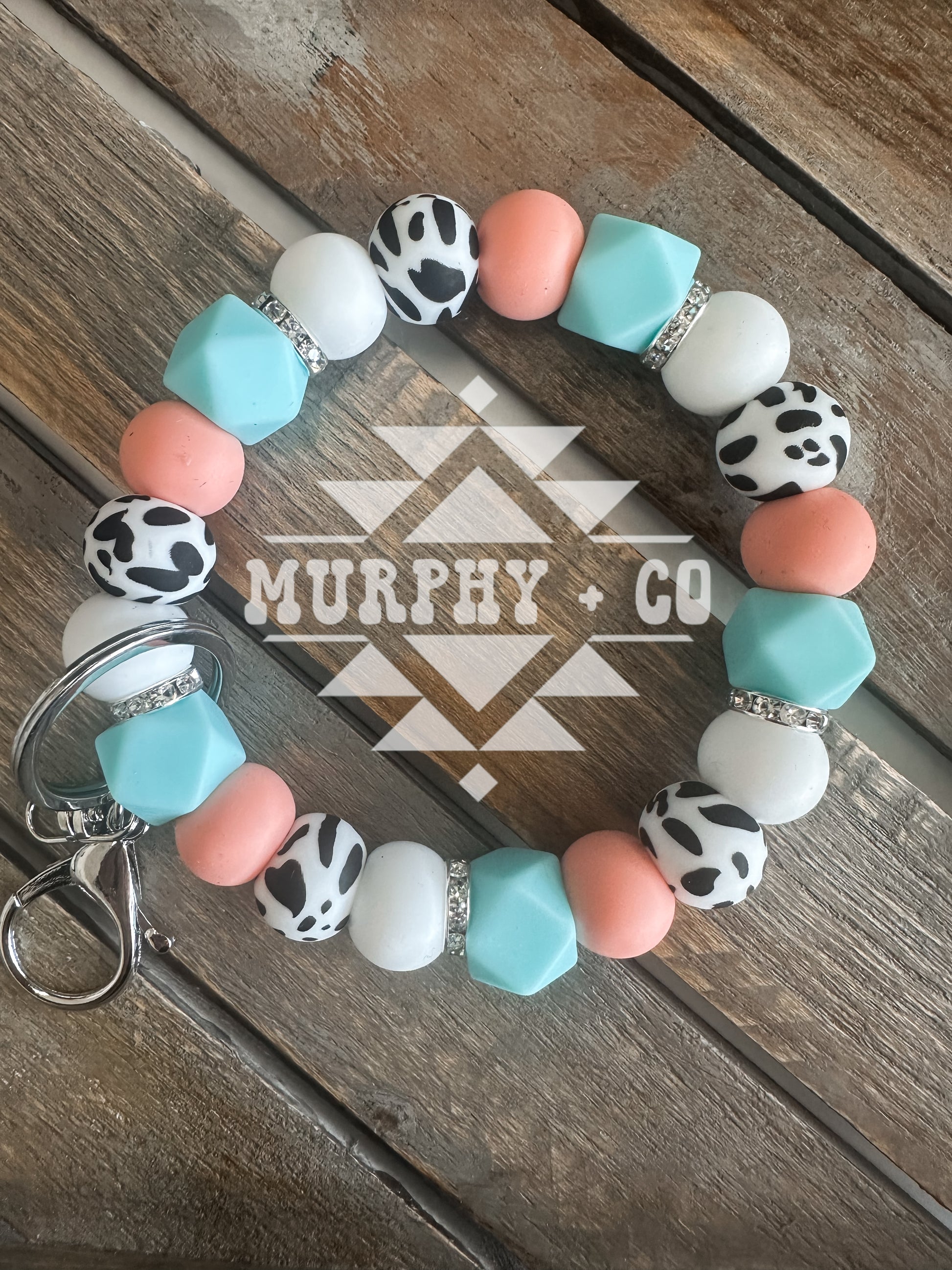 PEACH + AQUA COWPRINT WRISTLET
