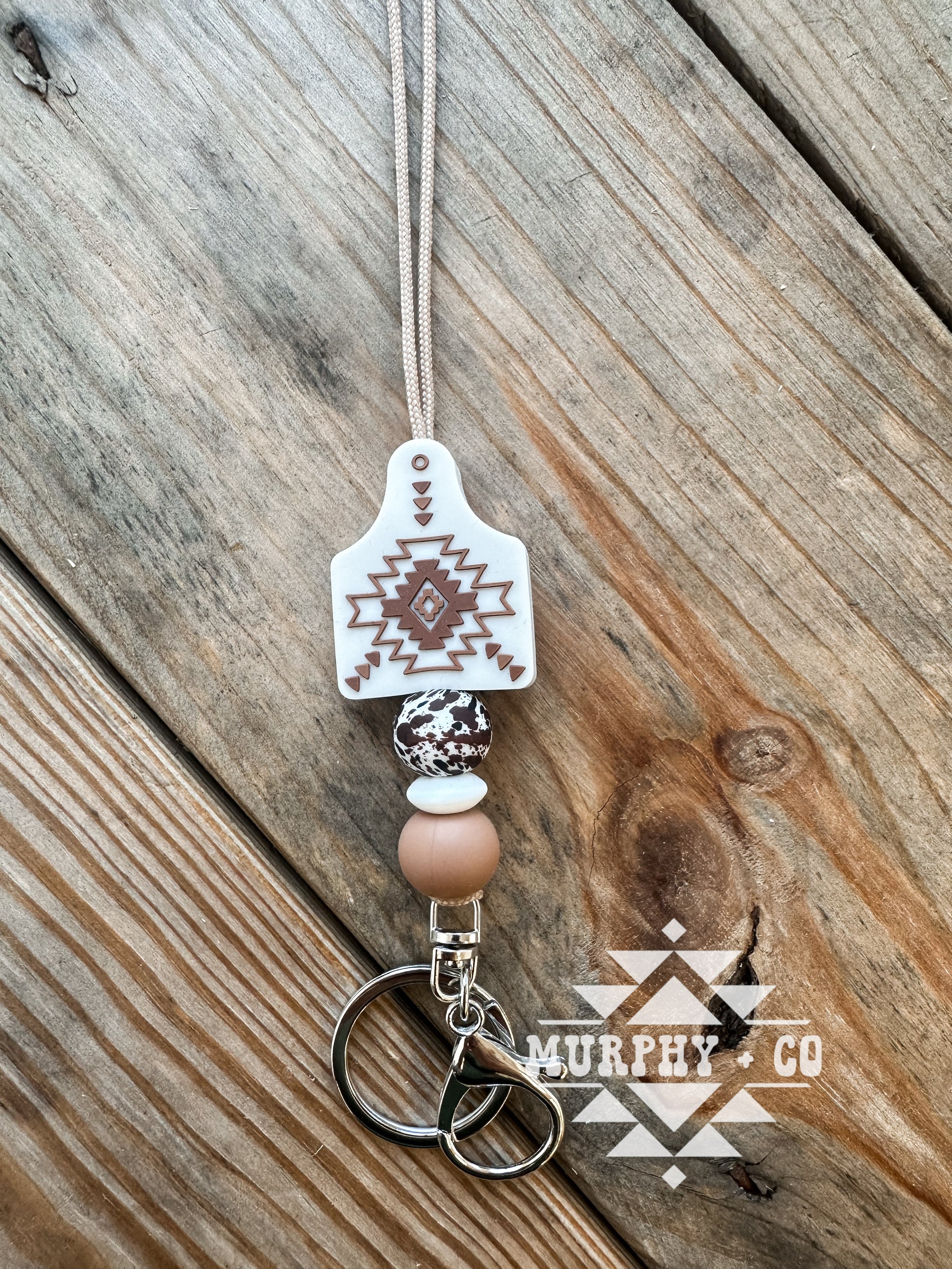 RUST + WOOL AZTEC COW TAG LANYARD