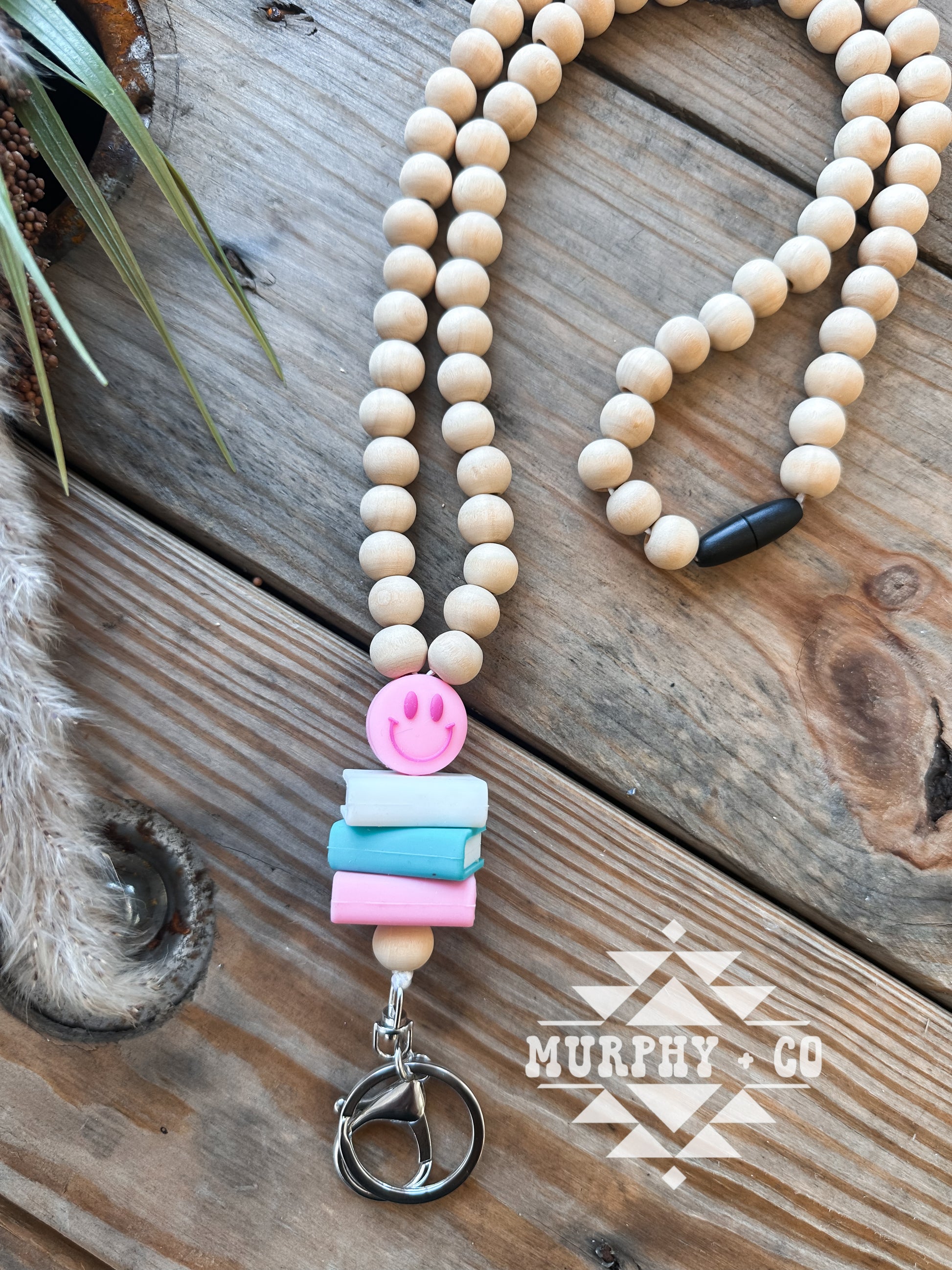 WOODEN BEADED SMILEY BOOKSTACK LANYARD