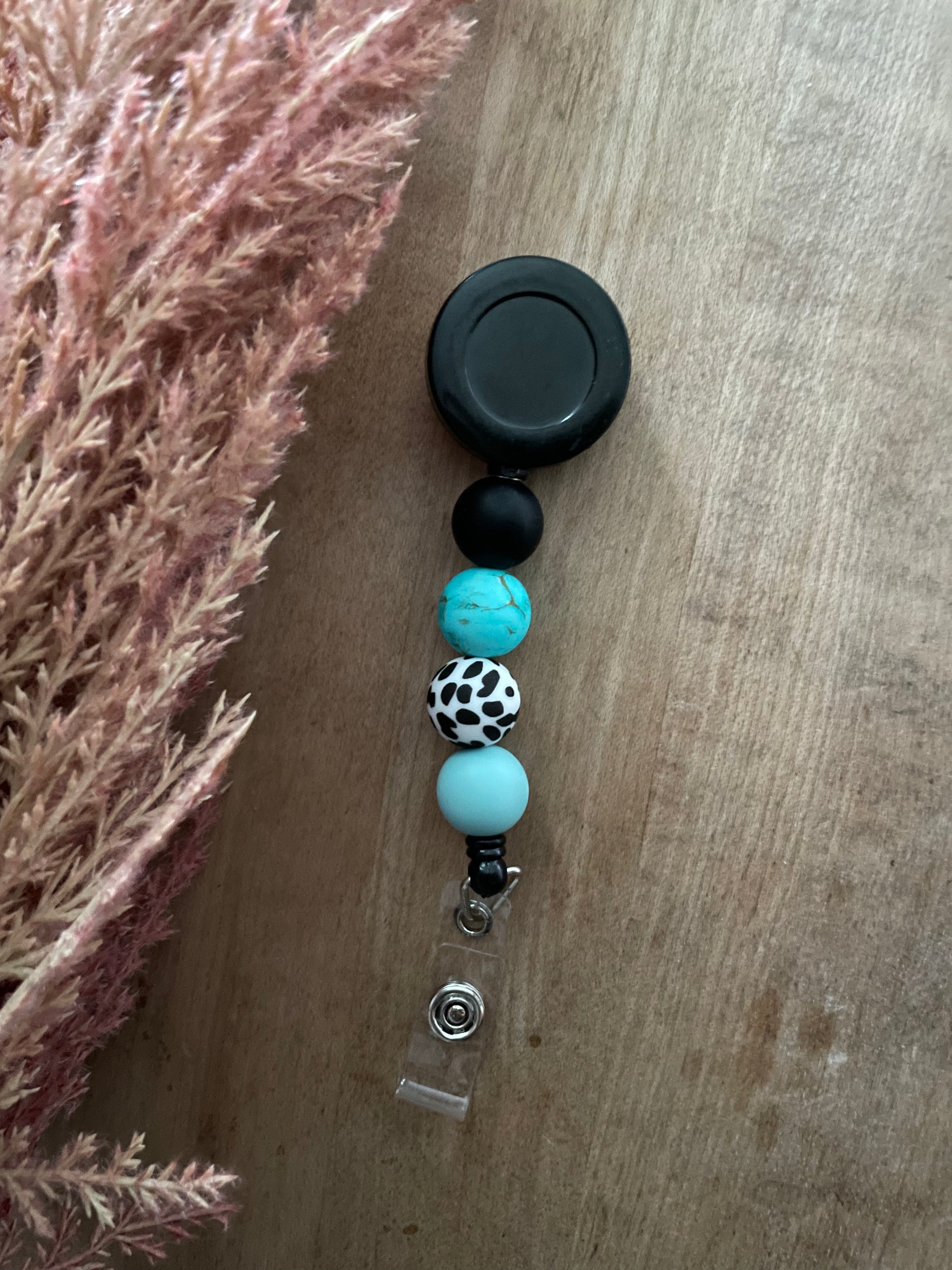 TURQUOISE VAQUERA BADGE REEL