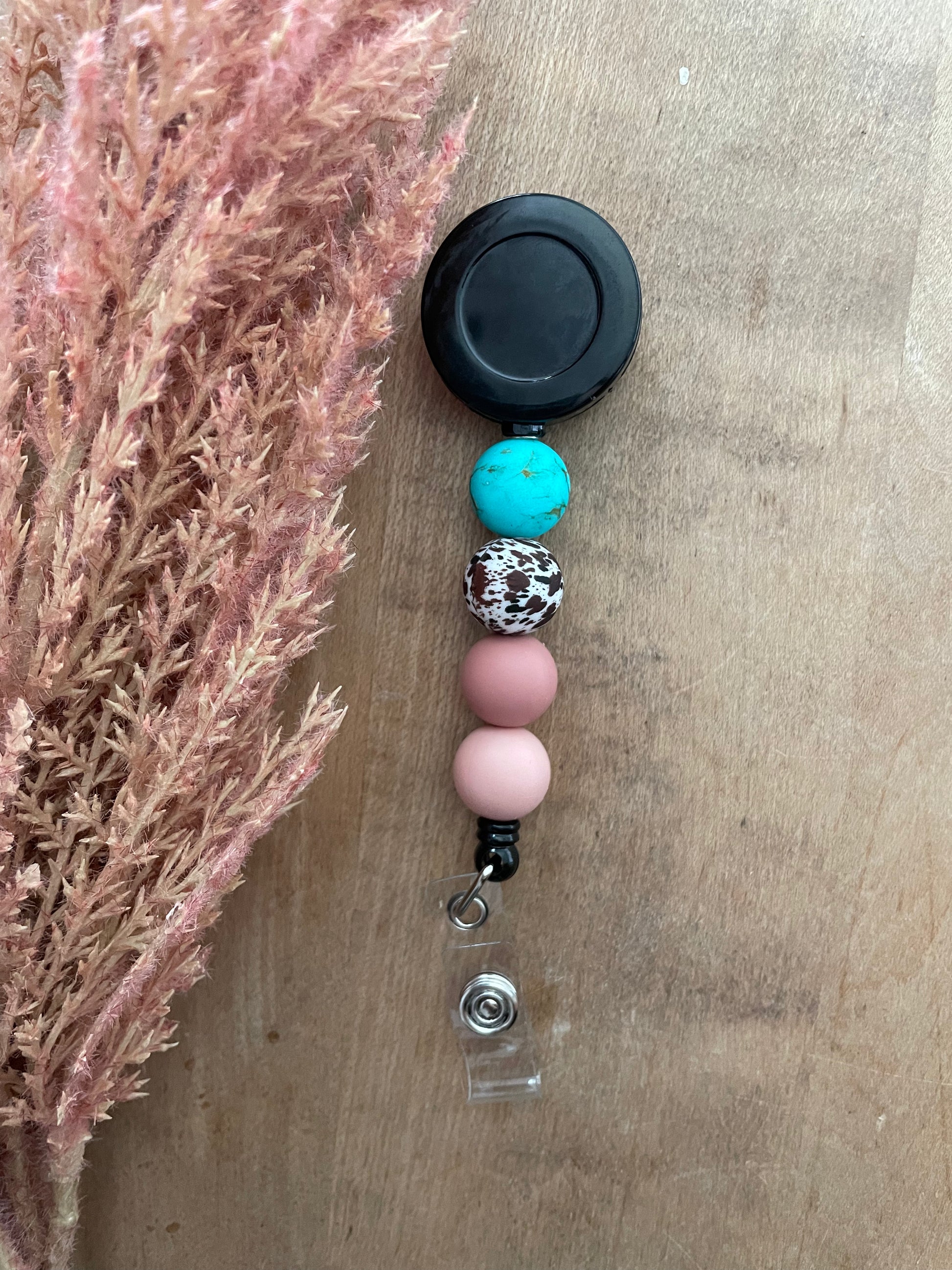 DUSTY COWGIRL BADGE REEL